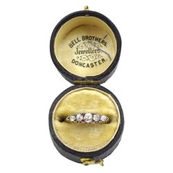 Early 20th century graduating five stone diamond ring, stamped 18ct
