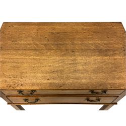 19th century oak low side table, the projecting top over two drawers, raised on square supports 