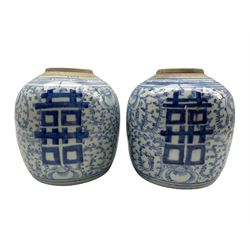 Pair of 19th century Chinese underglaze blue ginger jars decorated with shuangxi amid flowering tendrils, lacking covers H23cm