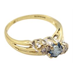 9ct gold three stone London blue topaz and diamond ring, hallmarked