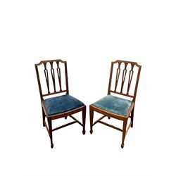 Set twelve (10+2) 20th century mahogany dining chairs with drop in seat pad, raised on peg feet 