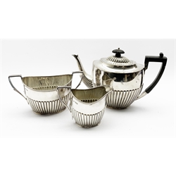 Late Victorian silver three piece tea set of oval design with half body reeded decoration, the tea pot with blackwood handle and lift.  Height of tea pot 16cm Sheffield 1901 Maker Atkin Bros. 30oz gross