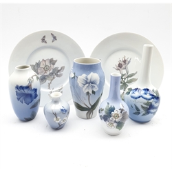 Royal Copenhagen bottle shape vase with flowers on a shaded ground H19cm, four other Royal Copenhagen floral vases and a pair of plates D22cm