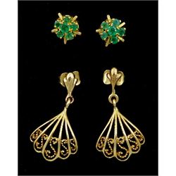 Pair of gold pendant stud earrings and a pair of gold emerald cluster stud earrings, both hallmarked 9ct