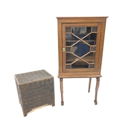 Early 20th century walnut display cabinet, with astragal glazed door enclosing two shelves, raised on slender cabriole supports with claw feet, (W67cm, H132cm, D45cm) together with a stained and carved hardwood box, with hinged lid revealing lift out tray, (W50cm)