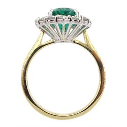 18ct gold oval emerald and round brilliant cut diamond cluster ring, hallmarked, emerald approx 2.70 carat, total diamond weight approx 0.75 carat