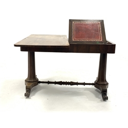 Mid 19th century rosewood library table, the revolving top moving to reveal stationery wells and sloped tooled leather reading/writing surface, raised on two octagonal turned supports united by turned stretcher, each on platform base terminating in scrolled feet and metal castors, W122cm, H77cm, D60cm