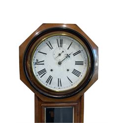 Ansonia - American 19th-century 8-day spring driven wall clock, with a twin train movement striking the hours on a gong, with an eighteen-inch octagonal wooden bezel and twelve-inch painted dial with Roman numerals and second’s dial, original steel hands (minute hand detached but present) within a flat glass and spun brass bezel, mahogany  and ebonised case with a  fully glazed trunk door and visible pendulum with a brass bob. 