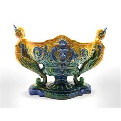 Large Continental Majolica centrepiece, modelled as two figureheads supporting the relief moulded bowl, L53cm