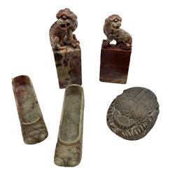 Pair of miniature Chinese soapstone slippers L8.5cm, two soapstone dogs of Fo seals and a scarab, the base carved with hieroglyphs