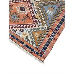 Small flat woven rug or mat, stepped geometric field decorated with three lozenge medallions, decorated with stylised animal motifs, triple band border 