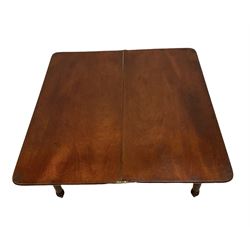 19th century mahogany tea table, fold-over swivel top, raised on turned supports 
