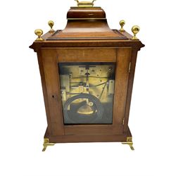 A late 19th century Mahogany Bracket clock with a brass handle to the bell top pediment, foliate brass spandrels flanking the glazed full length ogee shaped door, with reeded canted corners and pierced wooden sound frets to the sides, on a brass fronted moulded plinth raised on corresponding bracket feet, with a deeply engraved gilt brass dial and five-inch silvered chapter ring with Roman numerals, minute track and five minute Arabic’s, matted dial center with pierced trefoil steel hands, subsidiary ring for strike/silent operation, eight day chain driven twin fusee movement striking the hours and half hours on a coiled gong, rack strike with a recoil anchor escapement, pendulum holdfast to the backplate, chapter ring inscribed “ A & H Rowley, London”.
With key.
Arthur and Henry Rowley were a firm of London clock retailers, at 67 Lion Street, Clerkenwell (1860-9) and afterwards at 180 Grey’s Inn Road, finally at 40 Theobalds Road , London (1881-1906).  
