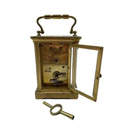 An early 20th century French corniche carriage clock with an eight-day timepiece movement, jewelled lever platform escapement with timing screws, four glass panels and an oval glass panel to the top, white enamel dial with roman numerals and minute markers (minute hand missing).



