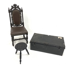 Victorian oak hall chair, cresting rail carved with lions flanking shield, over pierced acanthus decoration, seat and back upholstered in faux leather, raised on spiral turned supports, (W47cm) a black japanned uniform trunk with carry handle to each end, the top inscribed 'D W Shuttleworth' (W90cm) and carved oak stool, 