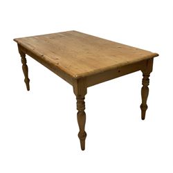 Rectangular pine kitchen table, raised on turned supports W 165cm