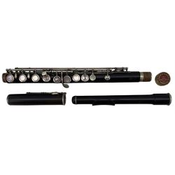 Cocuswood flute by Rudall Carte & Co. Ltd., 23 Berners Street, Oxford Street, London, no. 6075, with nickel plated keys, cased, overall length 67.5cm