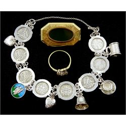 Gold three stone diamond ring, stamped 18ct, gold rectangular brooch and a silver coin bracelet