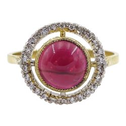 Silver-gilt cabochon garnet ring with cubic zirconia halo surround, stamped Sil
