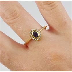 18ct gold oval sapphire and round brilliant cut diamond cluster ring, London 1986