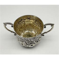 Victorian silver two handled porringer with embossed floral decoration and scroll handles, the cartouche inscribed 'Gladys 1895' H8cm London 1893 Maker Ackroyd Rhodes, Manoah Rhodes Ltd 7oz