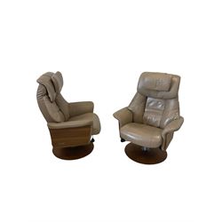 Zedere - pair of contemporary reclining swivel chairs together with matching footstools, upholstered in cream leather 