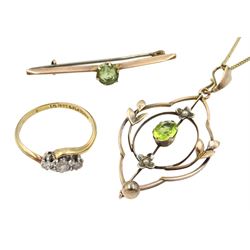 Edwardian 9ct rose gold peridot and seed pearl openwork pendant, on later 9ct gold necklace, 18ct gold three stone diamond crossover ring and a 9ct rose gold peridot bar brooch