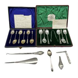 Set of six late Victorian silver 'apostle' coffee spoons with fluted bowls, cased, Birmingham 1897, set of six silver tea spoons and tongs Sheffield 1900, silver bladed and mother of pearl fruit knife, silver handled shoe horn and button hook and a single tea spoon