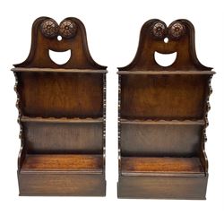 Pair of Georgian oak hanging spoon racks with pierced racks, lidded box to the base and rosette carving H62cm