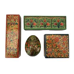 Kashmiri lacquer egg shaped box and cover, two of rectangular form and another of square form, all having bright floral decoration (4)