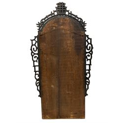 Early 20th century black lacquered chinoiserie wall mirror, the pierced fretwork pediment in tradition Chinese design with parcel-gilt detail, the arched frame painted with pagoda scenes and figures