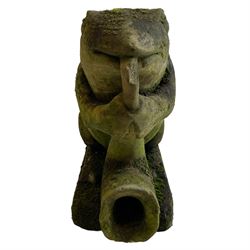 Weathered stone figure of a frog playing the saxophone, on rectangular plinth base
