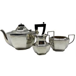 Silver three piece Art Deco tea set of panel sided design, the teapot with ebonised handle and lift Birmingham 1931 Maker Abrahams Bros. 34oz