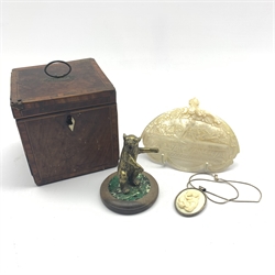  19th century abalone shell carved with a scene of the Last Supper, W14cm, 19th century ivory and silver mounted pendant carved in relief with Madonna and Child, early 19th century mahogany tea caddy and brass model of a bear on match striker style base   