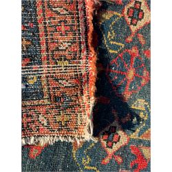 Early 20th century old Persian Hamadan runner, indigo ground field decorated with repeating stylised flower head motifs, triple band border with scrolling and floral design