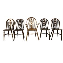 Set four mid-20th century beech dining chairs with wheel and stick backs, with beech and elm carver chair with wheel and stick back 