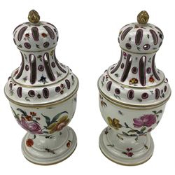Pair of late Vienna potpourri vases with pierced domed covers, gilt berry finials, painted with sprays of flowers, poultry and other birds on domed foot, blue beehive marks  H20cm (2) Provenance: From the Estate of the late Dowager Lady St Oswald