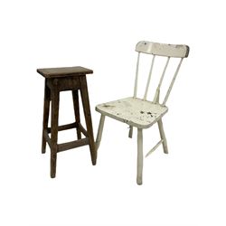 White spindle back chair together with pine stool