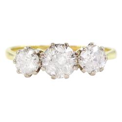 Early 20th century three stone old cut diamond ring, stamped Plat 18ct, total diamond weight 1.25 carat