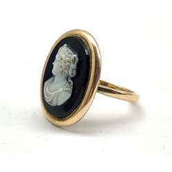 Gold black onyx cameo ring, stamped 9ct