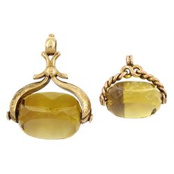Two late 19th century/early 20th century 9ct gold citrine swivel fobs