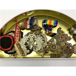 Tin containing World War I Victory medal to 267191 Pte G Wright W. Rid. R. military badges etc
