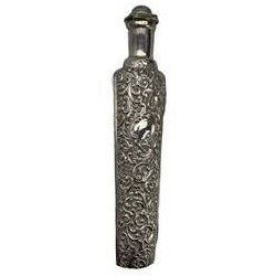 Late Victorian silver cased glass toilet water bottle inscribed 'Superior Old English Lavender Water, Bond St. London' the hinged silver case decorated with scrolls L23cm Birmingham 1898