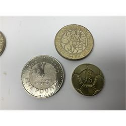 Seven Queen Elizabeth II UK five pound coins, nine old style two pound coins, two Bailiwick of Jersey 2003 silver fifty pence coins and Alderney 2003 silver fifty pence coin