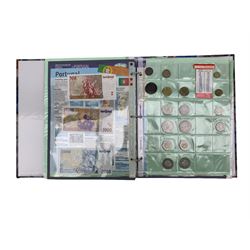 Coins and banknotes from the 'Money of the World' collection, including Australia, Cook Islands, New Zealand, Hong Kong, Singapore,  France, Spain, Eastern Caribbean Central Bank, Bank of Jamaica etc, housed in six ring binder folders