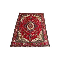 Hand knotted Persian rug from Tabriz region with red field, red border and all over floral design (395cm x 295cm