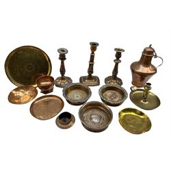 Three 19th century silver-plated bottle coasters, Portuguese copper pitcher, embossed copper dish, 19th century brass chamber stick and other metal wares 