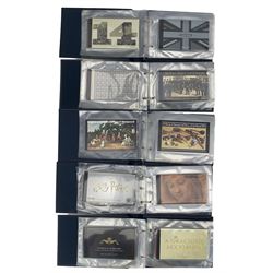 Approximately seventy-five Queen Elizabeth II 'Royal Mail Book of Stamps', housed in five 'Royal Mail Prestige Stamp Books' folders