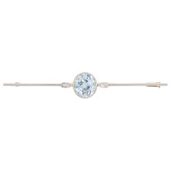 Early 20th century blue zircon and rose cut diamond bar brooch, the milgrain set round cut blue zircon flanked by rose cut diamond set leaves, to a tapering bar, stamped 15ct & PT