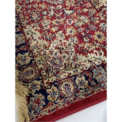  Persian design red ground runner rug, with three medallions on red field, 78cm x 310cm  